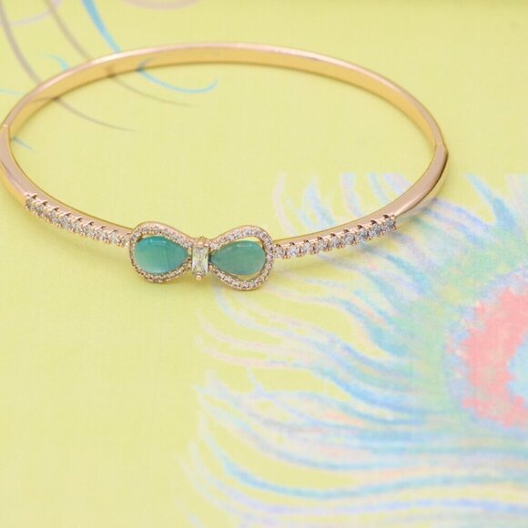 Elegant Rose Gold Bangle with Aqua Bow and Crystal Accents, XPBL0423 - Picture 4 of 12